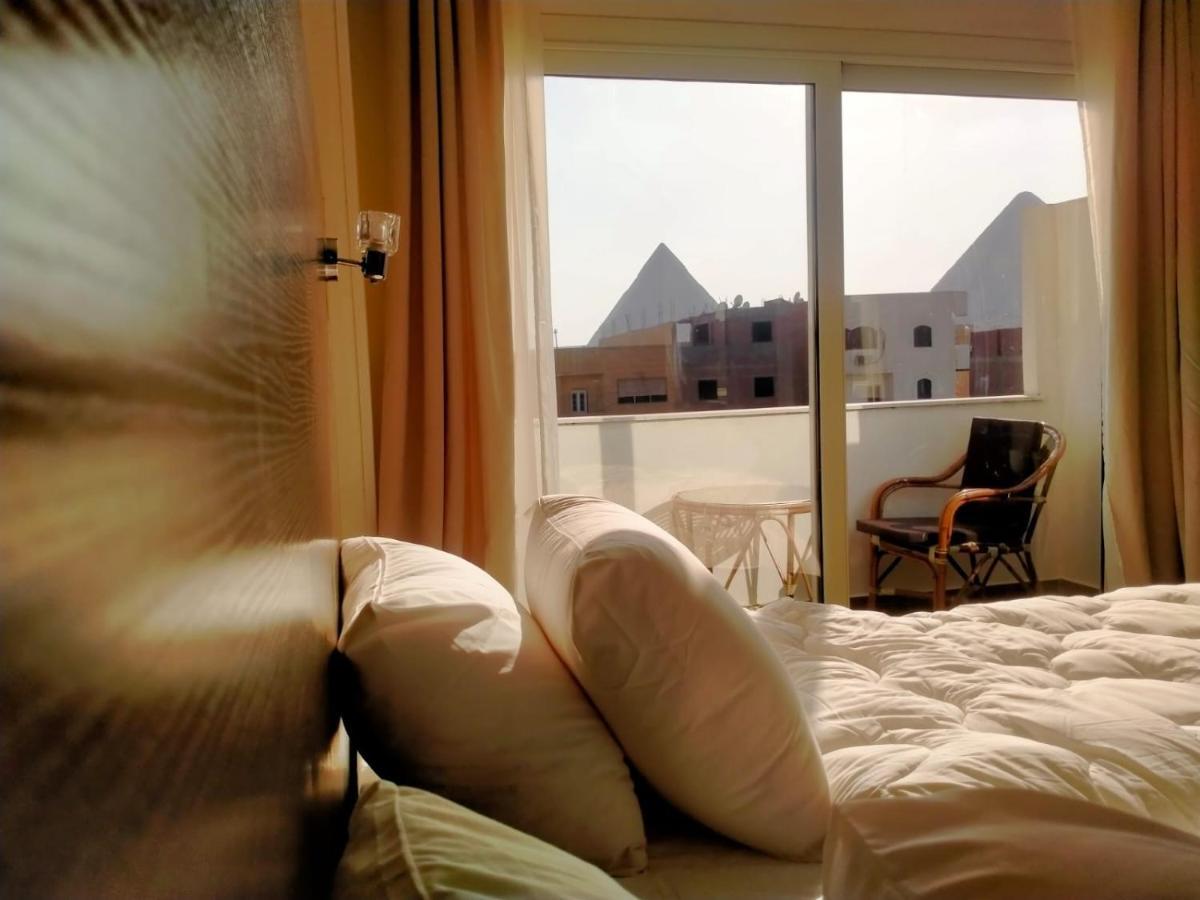 Hassan Pyramids فندق *