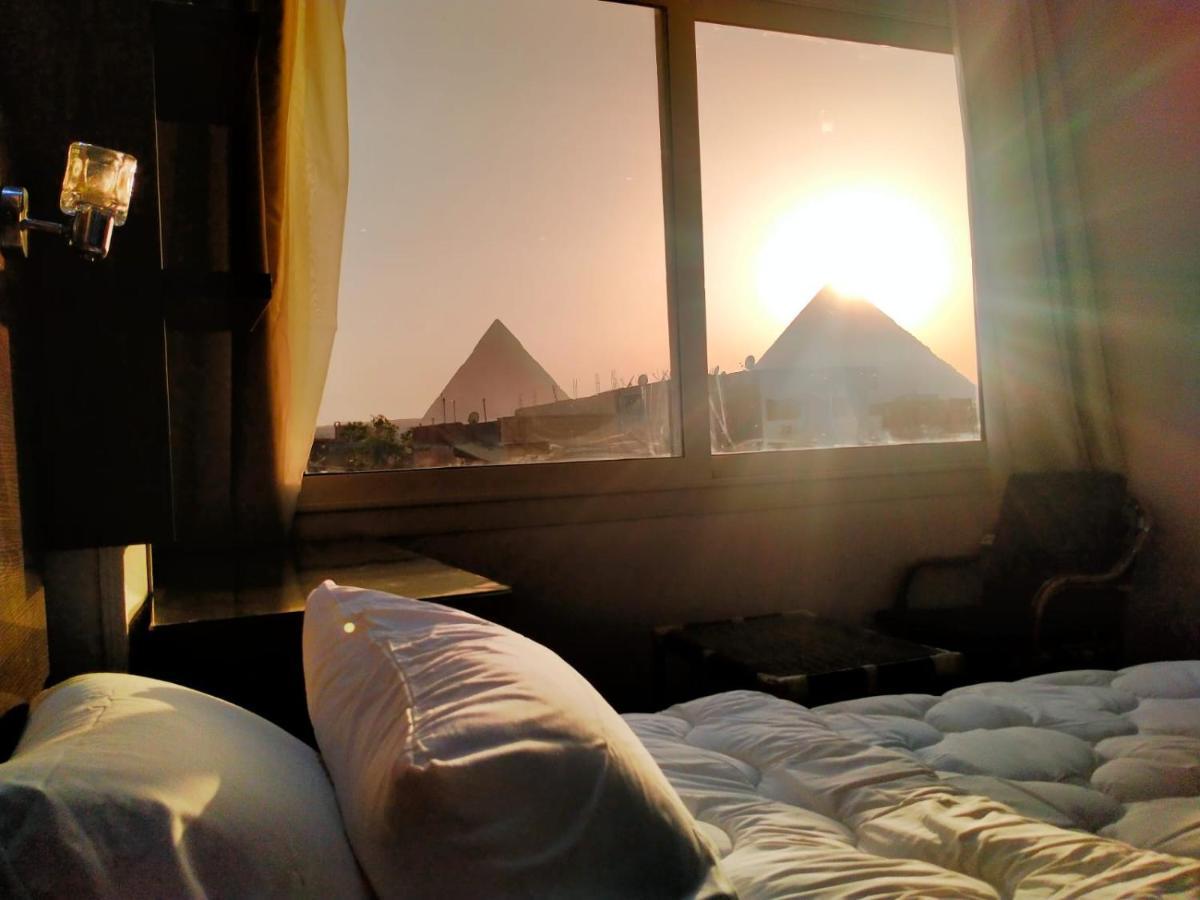 Hassan Pyramids فندق *